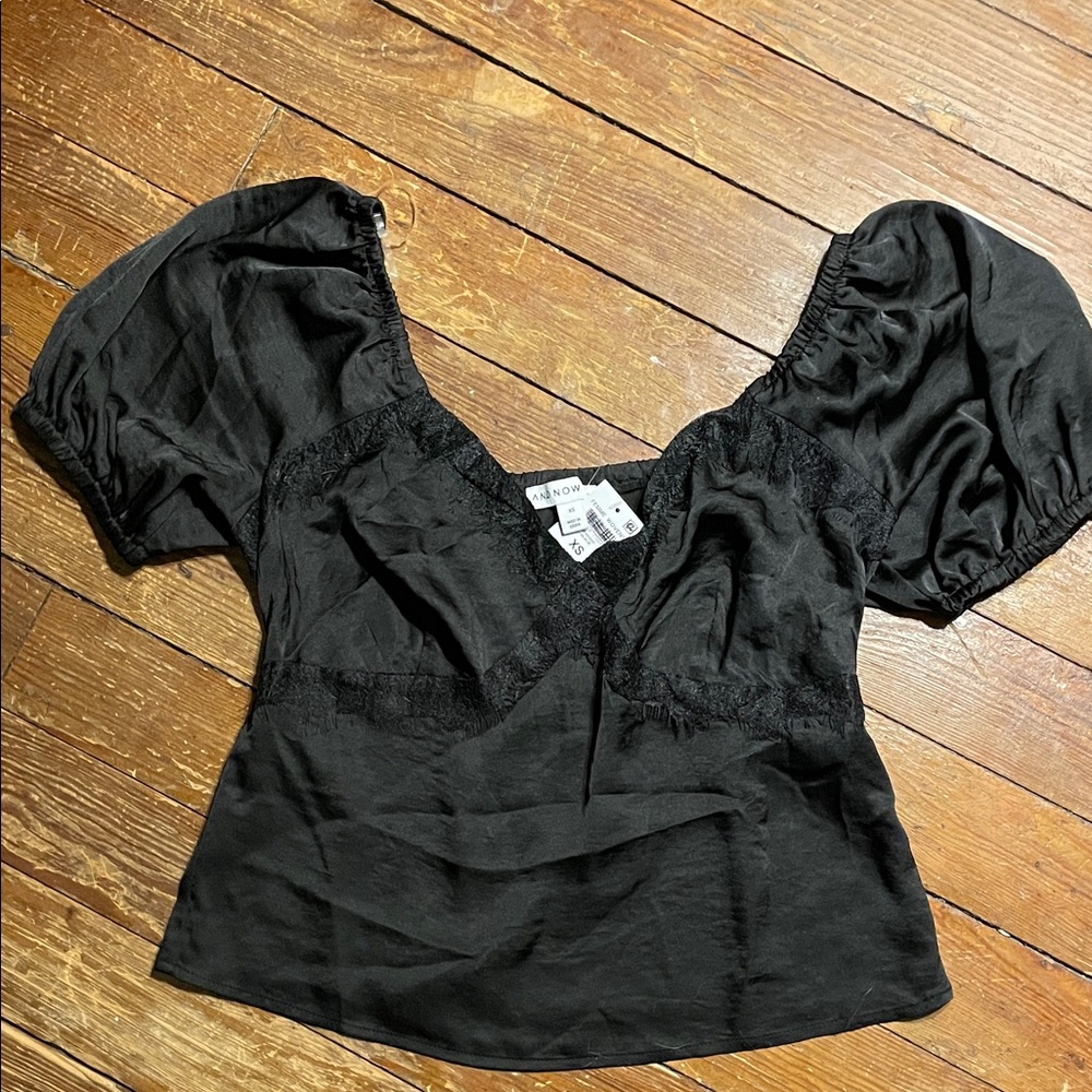 And Now This Charming Black Top